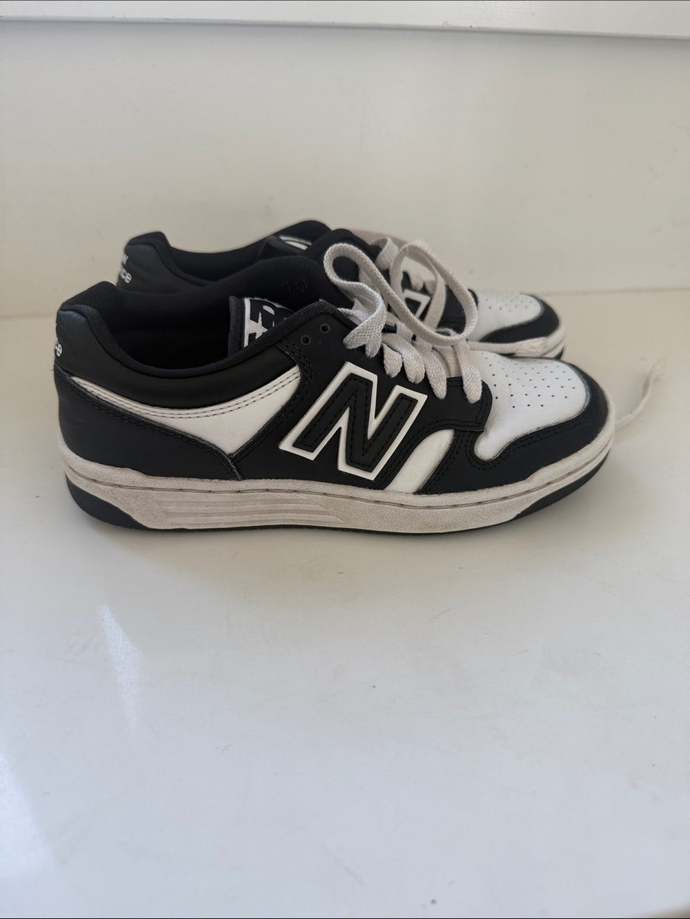 New Balance Kids Black and White Low-Top Sneakers